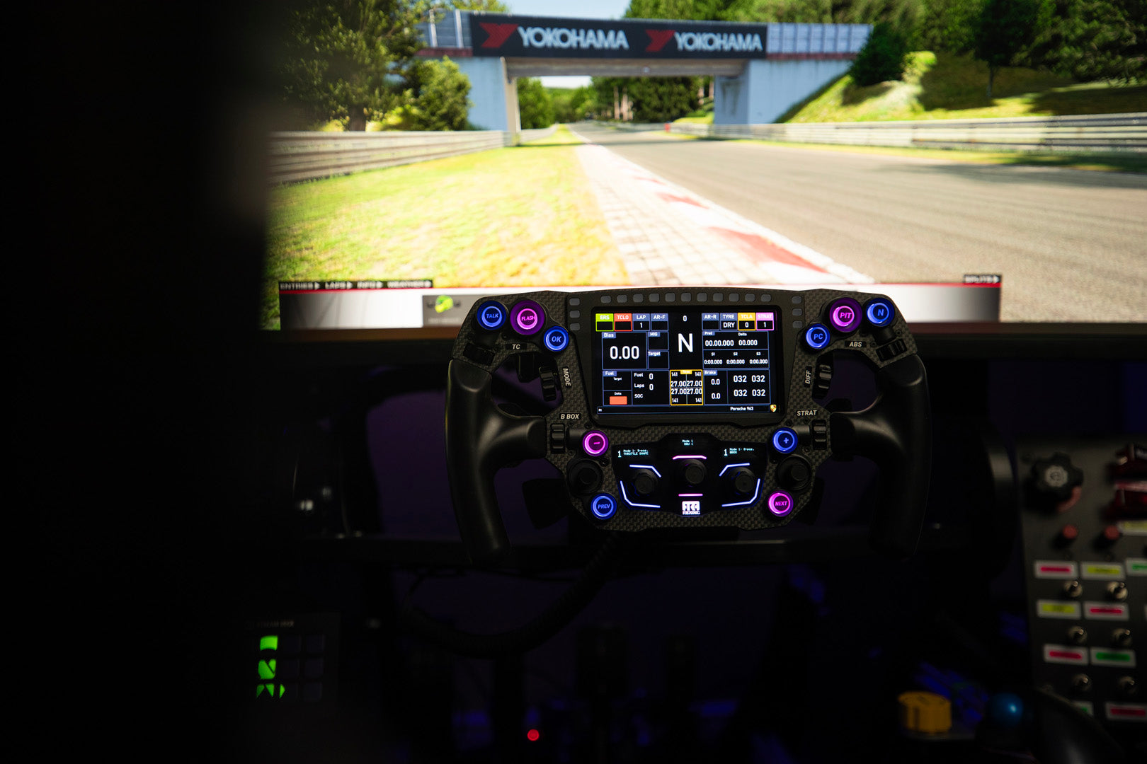 a racing steering wheel on a simulator